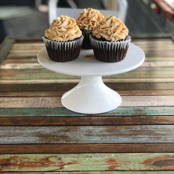 Brown's Basics Bakery & Eatery - Giant Chocolate Cupcake with Peanut butter buttercream and caramel drizzle. - Bakeries Near Me Brown's Basics Bakery & Eatery - Giant Chocolate Cupcake with Peanut butter buttercream and caramel drizzle. - Bakeries Near Me