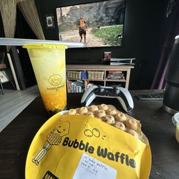 Lemon mango slushy with a boba waffle