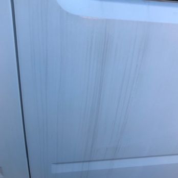 Apollo's Chariots - Dirt running down the exterior of limo. - Airport Shuttles Near Me - Sanford, Florida
