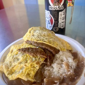 Rainbow Drive-In - Loco Moco! Iconic restaurant is a landmark and featured in The Food Network's Diners, Drive Ins and Dives, CBS' Hawaii 5-0 and Magnum P.I. - Hawaiian Near Me - Honolulu, Hawaii