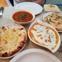 The Thames - Left to right: Sweet naan, a curry (not sure which one), butter chicken, and garlic naan