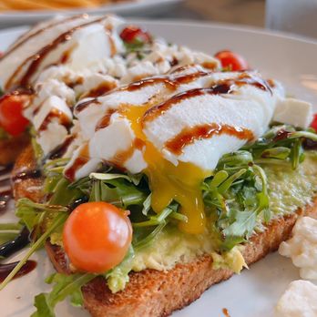 Broken Yolk Cafe - Feta Avocado Toast w/Egg - Breakfast & Brunch Near Me - Chandler, Arizona Broken Yolk Cafe - Feta Avocado Toast w/Egg - Breakfast & Brunch Near Me - Chandler, Arizona