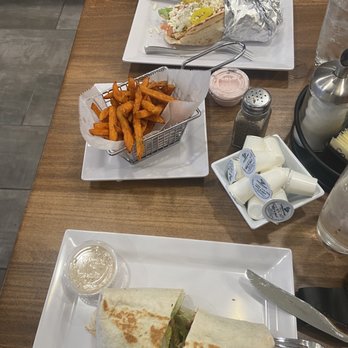 The Corner House - Chicken ceaser wrap Sweet potato fries Greek pita - American Near Me - Shelby Township, Michigan The Corner House - Chicken ceaser wrap Sweet potato fries Greek pita - American Near Me - Shelby Township, Michigan