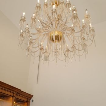 Avva Coffee - a large chandelier in a dining room - Coffee & Tea Near Me - Beverly Hills, California