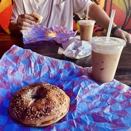 Iced caramel comet latte, white chocolate raspberry iced latte, and two sausage egg and cheese bagels Iced caramel comet latte, white chocolate raspberry iced latte, and two sausage egg and cheese bagels