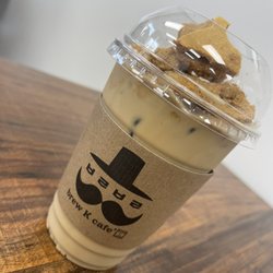 Dalgona cafe latte Has a softish crumbly coffee tasting candy on top. Tasty 5/5 taste