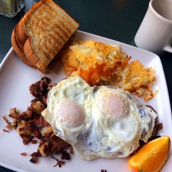 Lowell's Restaurant - Corned beef hash with eggs, toast and hash browns. Tasty, but also pricey. - American Near Me - Seattle, Washington