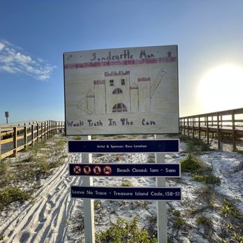 Sunset Vista Park - Sunset Beach Sign, Sand Castle man wants trash in the can, Sunset Vista Park & Beach Access Point, Treasure Island - Parks Near Me - Treasure Island, Florida