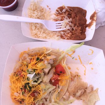 Zack's - 1 out of 2 tacos left, and half of the beans and rice left. This meal was so yummy!! - Bike Rentals Near Me - Huntington Beach, California Zack's - 1 out of 2 tacos left, and half of the beans and rice left. This meal was so yummy!! - Bike Rentals Near Me - Huntington Beach, California