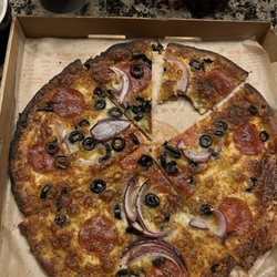 Blaze Pizza - The one bite I managed to eat of this horrifying burnt excuse of a pizza.