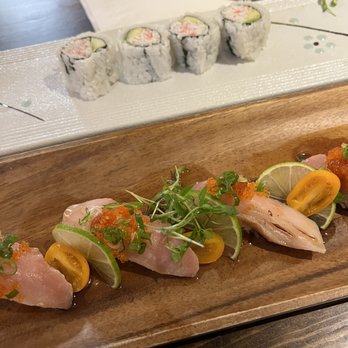 Sushi King - california roll (half eaten) and melting albacore sushi - Sushi Bars Near Me - Fairfield, California