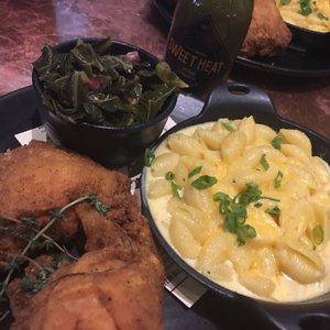 Photo of Farmerbrown - San Francisco, CA, United States. Fried chicken with shells cheese and hamhock greens as the sides. Delicious!