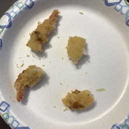 a paper plate with some food on it