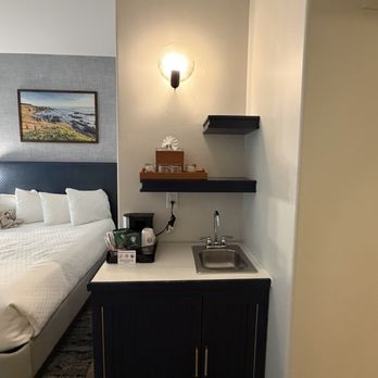 El Colibri Hotel & Spa - Small fridge in the cabinet. - Hotels Near Me - Cambria, California El Colibri Hotel & Spa - Small fridge in the cabinet. - Hotels Near Me - Cambria, California