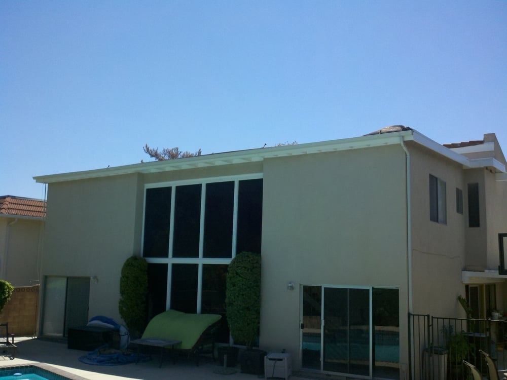 Slide of Mike's Roofing & Building