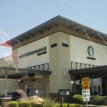 Starbucks - a starbucks coffee shop with a car parked in front of it - Coffee & Tea Near Me - Litchfield Park, Arizona Starbucks - a starbucks coffee shop with a car parked in front of it - Coffee & Tea Near Me - Litchfield Park, Arizona