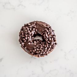 Chocolate chip on chocolate cake donut