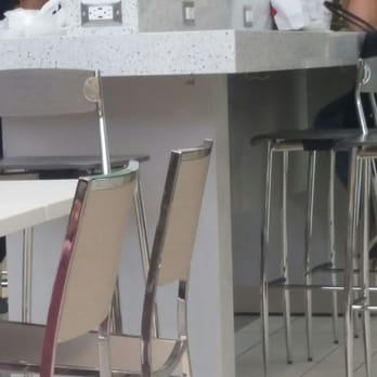 Dadeland Mall - New high top seating with purse hangers and charging outlets - Shopping Centers Near Me - Miami, Florida Dadeland Mall - New high top seating with purse hangers and charging outlets - Shopping Centers Near Me - Miami, Florida