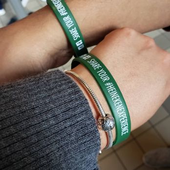 Heineken Experience - Bracelets that hold 2 pins for beer at the end of the tour. - Museums Near Me - Amsterdam, New Hampshire
