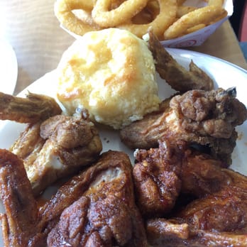 Uncle Lous Fried Chicken - 4 wing special. Half original and half spicy. - Chicken Wings Near Me - Memphis, Tennessee Uncle Lous Fried Chicken - 4 wing special. Half original and half spicy. - Chicken Wings Near Me - Memphis, Tennessee