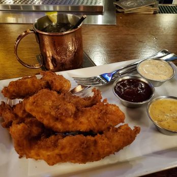 D4 Irish Pub & Cafe - chicken fingers with dipping sauces.  strawberry mule to drink. Beer Battered Chicken Fingers - Irish Pub Near Me - Chicago, Illinois