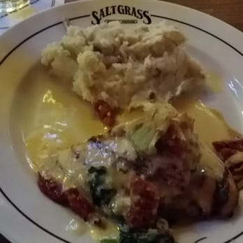 Saltgrass Steak House - stuffed chicken stuffed with artichoke, spinach, and sun dried tomatoes with a side of garlic mashed potatoes. Delicious! - Steakhouses Near Me - Norman, Oklahoma Saltgrass Steak House - stuffed chicken stuffed with artichoke, spinach, and sun dried tomatoes with a side of garlic mashed potatoes. Delicious! - Steakhouses Near Me - Norman, Oklahoma