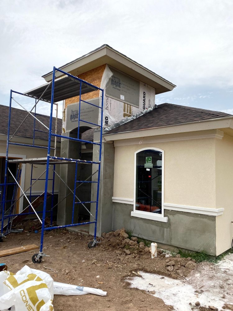 Slide of Excellence Roofing & Construction