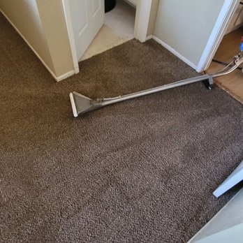 Espinosa's Cleaning - a person standing on the floor - Carpet Cleaning Near Me Espinosa's Cleaning - a person standing on the floor - Carpet Cleaning Near Me