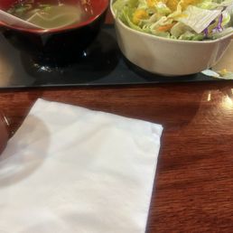 Clear soup and salad with ginger dressing
