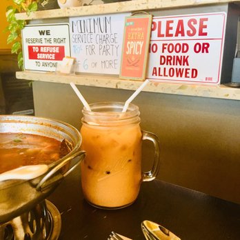 Chada Thai - Signs photobombing my Thai tea - Thai Near Me - Garden Grove, California Chada Thai - Signs photobombing my Thai tea - Thai Near Me - Garden Grove, California