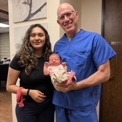 Roy Ayalon, MD - Dr. Ayalon holding his hard work haha
