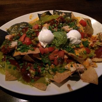Yard House - A massive plate of chicken nachos - New American Near Me - West Nyack, New York Yard House - A massive plate of chicken nachos - New American Near Me - West Nyack, New York