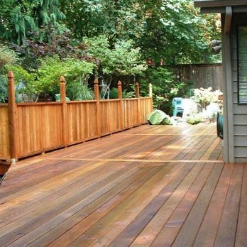 North Texas Building & Remodeling - a wooden deck with a bench - General Contractors Near Me North Texas Building & Remodeling - a wooden deck with a bench - General Contractors Near Me