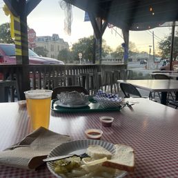 Chopped bbq, pickled onions and house lager.