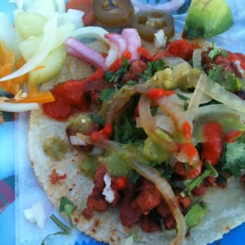 Taqueria Gigante - a close up of a taco - Street Vendors Near Me - Austin, Texas