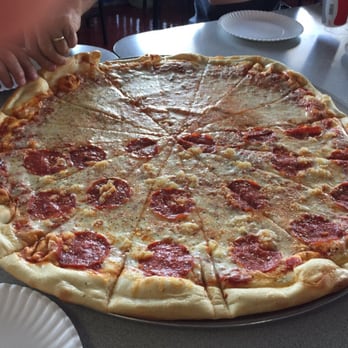 Richie B's - 25 inch pizza half cheese half pepperoni & pineapple is really good. - Pizza Near Me - Dothan, Alabama Richie B's - 25 inch pizza half cheese half pepperoni & pineapple is really good. - Pizza Near Me - Dothan, Alabama