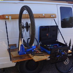 Mobile Bike Works Santa Fe - Truing a customer wheel at the mobile bike shop