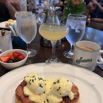 Sadelle's - Ham Benedict's, fruit, coffee and pineapple mimosa - Breakfast & Brunch Near Me - Las Vegas, Nevada Sadelle's - Ham Benedict's, fruit, coffee and pineapple mimosa - Breakfast & Brunch Near Me - Las Vegas, Nevada