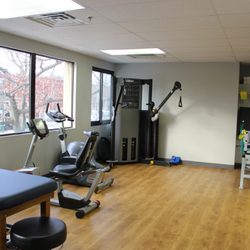 Paggi Physical Therapy & Sports Rehabilitation - Clinic gym features state-of-the-art cable column, leg press, stationary bikes and many other useful tools to help improve your mobility.