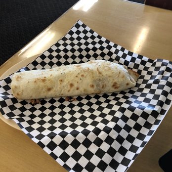 Tortilleria Tepito - a tortilla on a checkered napkin - Mexican Near Me - Joshua, Texas