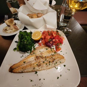Trattoria Amici - Sea Bass (Branzino). Ask for a different side! Don't let them give you chopped tomatoes as a side! But the fish is delicious - Italian Near Me - Glendale, California Trattoria Amici - Sea Bass (Branzino). Ask for a different side! Don't let them give you chopped tomatoes as a side! But the fish is delicious - Italian Near Me - Glendale, California