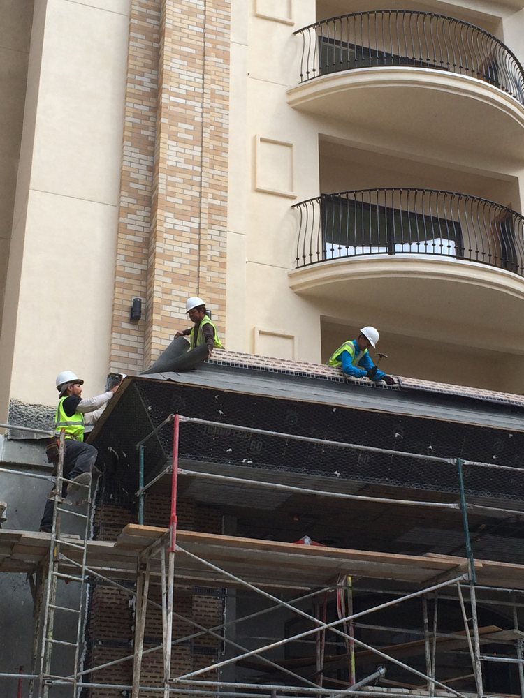 Slide of Ferguson & Melvin Roofing Contractor