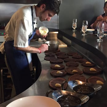 Trust - Chef Justin prepping our piping hot fresh bread - Tapas/Small Plates Near Me - Santa Ana, California Trust - Chef Justin prepping our piping hot fresh bread - Tapas/Small Plates Near Me - Santa Ana, California