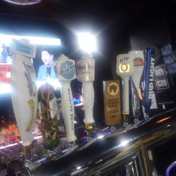 Eden Bar And Grill - a row of beer taps - Bars Near Me - Joliet, Illinois