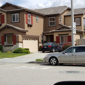 Painting And General Construction - a car parked in front of a house - Painters Near Me Painting And General Construction - a car parked in front of a house - Painters Near Me