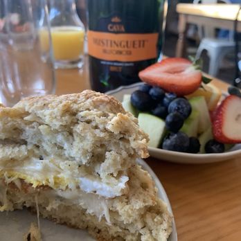 Chez Genèse - Amazing breakfast sandwich on a scratch-made rosemary cheddar biscuit! - French Near Me - Greensboro, North Carolina Chez Genèse - Amazing breakfast sandwich on a scratch-made rosemary cheddar biscuit! - French Near Me - Greensboro, North Carolina