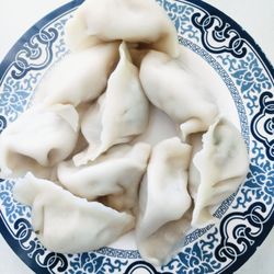 Queenie's Dumplings - 9 steamed dumpling - pork and cabbage, beef and onion, and pork and prawns are good, rest are kinda weird / not authentic