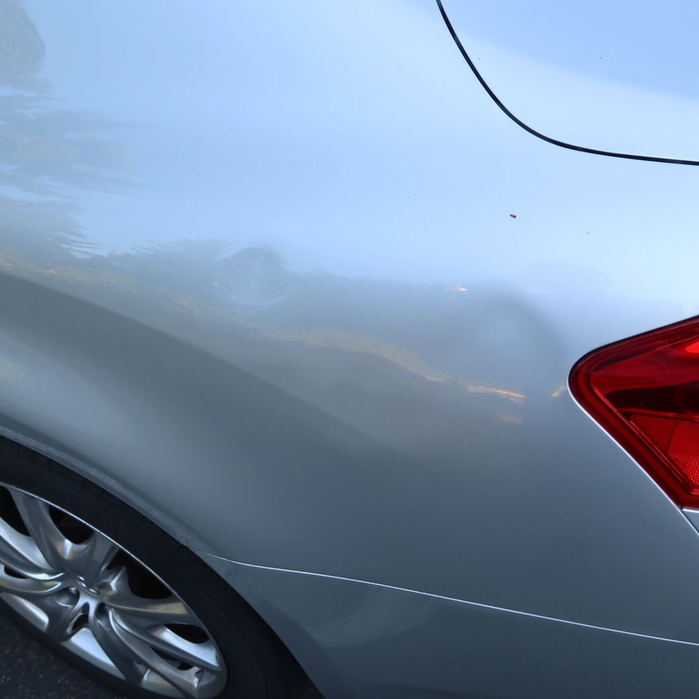 Two dents, impact area huge Two dents, impact area huge
