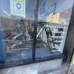 Heavy Metal Bike Shop - Electric bike for sale at the window