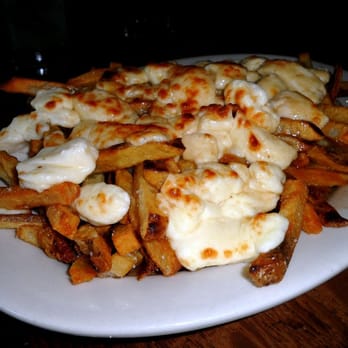Smith - Poutine - fries with cheese curds + gravy. - Bars Near Me - Seattle, Washington Smith - Poutine - fries with cheese curds + gravy. - Bars Near Me - Seattle, Washington